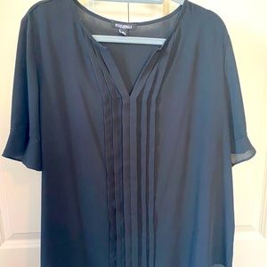 Gently used beautiful black blouse.  Front pleats!